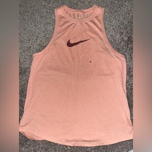 Nike Tennis. Peach Tank Top with Maroon swish. Women’s sz S